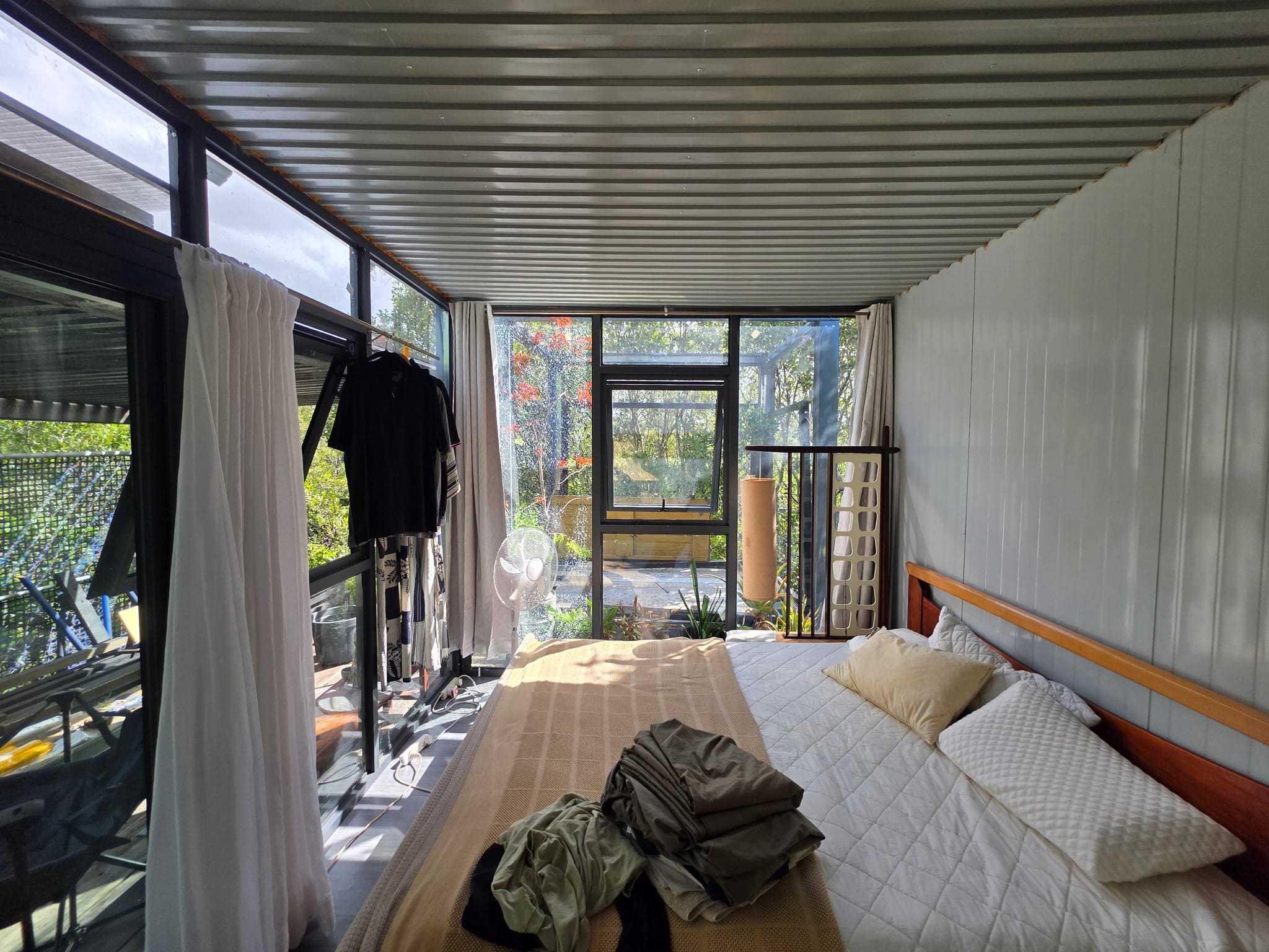 Pilates reformer studio inside portable pod with countryside view